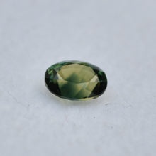 Load image into Gallery viewer, Parti-Color Australian sapphire - Half Yellow, Half Blue, and Shows as Deep Green - 0.64 ct.