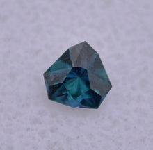 Load image into Gallery viewer, Astounding Chrome Kornerupine Gem - Intensely Polychroic - 0.49 ct. - Faceted by:  Scott Maier