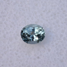 Load image into Gallery viewer, A Shifty Little Montana Sapphire - Clean, and light in color - Has Purple, Green, Blue, and Colorless Moods - 0.63 ct.