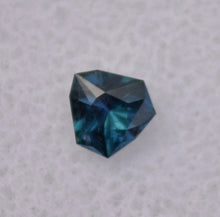 Load image into Gallery viewer, Astounding Chrome Kornerupine Gem - Intensely Polychroic - 0.49 ct. - Faceted by:  Scott Maier