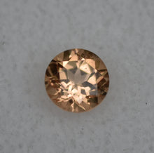 Load image into Gallery viewer, VERMONT Hessonite Garnet Gemstone - Ultra Rare - 0.61 ct. Round Brilliant