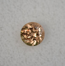 Load image into Gallery viewer, VERMONT Hessonite Garnet Gemstone - Ultra Rare - 0.61 ct. Round Brilliant