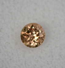 Load image into Gallery viewer, VERMONT Hessonite Garnet Gemstone - Ultra Rare - 0.61 ct. Round Brilliant