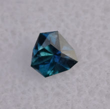 Load image into Gallery viewer, Astounding Chrome Kornerupine Gem - Intensely Polychroic - 0.49 ct. - Faceted by:  Scott Maier