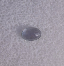 Load image into Gallery viewer, Purple-Facing Chrome Kornerupine Cabochon with Teal Axis - 0.3 ct.