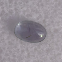 Load image into Gallery viewer, Purple-Facing Chrome Kornerupine Cabochon with Teal Axis - 0.3 ct.