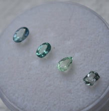 Load image into Gallery viewer, Chrome and Vanadium Kornerupine Color-Grade Set - Set of 4 Sleek, Top-Shelf Gems - 1.15 ctw.