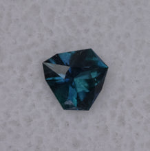 Load image into Gallery viewer, Astounding Chrome Kornerupine Gem - Intensely Polychroic - 0.49 ct. - Faceted by:  Scott Maier