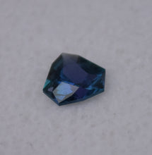 Load image into Gallery viewer, Astounding Chrome Kornerupine Gem - Intensely Polychroic - 0.49 ct. - Faceted by:  Scott Maier