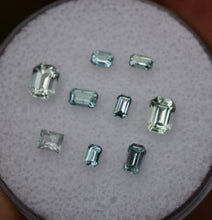 Load image into Gallery viewer, Chrome and Vanadium Kornerupine Emerald-Cut Melee Set (9 pcs.) - 1.64 ctw.