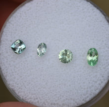 Load image into Gallery viewer, Mixed Chrome and Vanadium Kornerupine Melee Gems - 0.95 ctw.