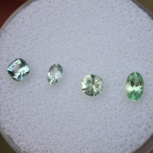 Load image into Gallery viewer, Mixed Chrome and Vanadium Kornerupine Melee Gems - 0.95 ctw.