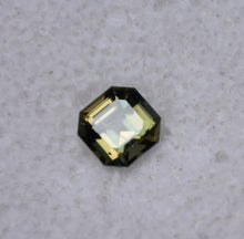 Load image into Gallery viewer, Dichroic Yellow and Green Kornerupine from Madagascar - 0.62 ct.