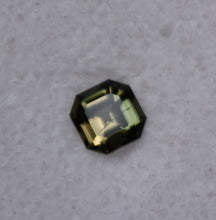 Load image into Gallery viewer, Dichroic Yellow and Green Kornerupine from Madagascar - 0.62 ct.
