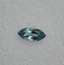 Load image into Gallery viewer, Eye-Clean Trichroic Chrome Kornerupine Gem - Fantastic colors - Marquis shape - 0.29 ct.