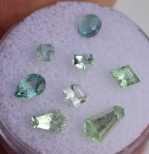 Load image into Gallery viewer, Mixed Kornerupine *Wholesale* (8) - Chrome and Vanadium Gemstones - 2.22 ctw.