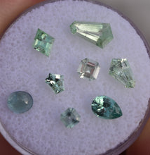 Load image into Gallery viewer, Mixed Kornerupine *Wholesale* (8) - Chrome and Vanadium Gemstones - 2.22 ctw.