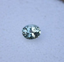 Load image into Gallery viewer, A Shifty Little Montana Sapphire - Clean, and light in color - Has Purple, Green, Blue, and Colorless Moods - 0.63 ct.