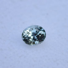 Load image into Gallery viewer, A Shifty Little Montana Sapphire - Clean, and light in color - Has Purple, Green, Blue, and Colorless Moods - 0.63 ct.