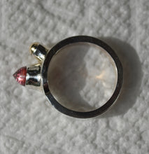 Load image into Gallery viewer, Punk Princess Ring - Hefty Sterling Silver, 14kyg Accent, and a Mahenge Garnet Bullet Cabochon - Stone and Ring by:  Scott Maier