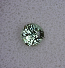 Load image into Gallery viewer, Custom Round Vanadium Kornerupine Gemstone - 1.345 ct. Unique Design, and EYE CLEAN - by Scott Maier