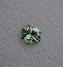 Load image into Gallery viewer, Custom Round Vanadium Kornerupine Gemstone - 1.345 ct. Unique Design, and EYE CLEAN - by Scott Maier