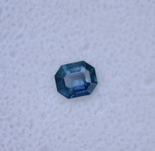 Load image into Gallery viewer, Amazing Tri-Chroic Chrome Kornerupine in a Classic Emerald Step-Cut - 0.8 ct.