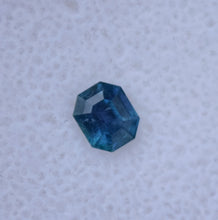 Load image into Gallery viewer, Amazing Tri-Chroic Chrome Kornerupine in a Classic Emerald Step-Cut - 0.8 ct.