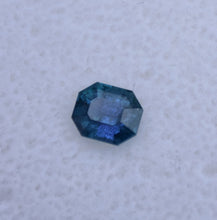Load image into Gallery viewer, Amazing Tri-Chroic Chrome Kornerupine in a Classic Emerald Step-Cut - 0.8 ct.