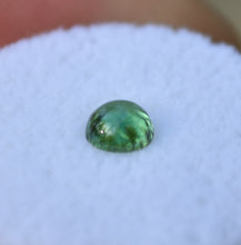 Load image into Gallery viewer, Unusually Deep Green Kornerupine Cabochon - Perfect High Dome Shape - Great Clarity - 0.52 ct.