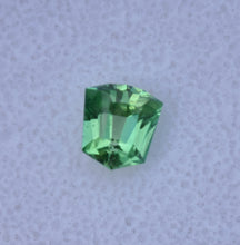 Load image into Gallery viewer, Piercingly Kelley-Green Vanadium Kornerupine Custom Gemstone - Original Design and Cutting by Scott Maier - 1.28 ct.