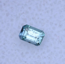 Load image into Gallery viewer, Chrome Kornerupine Emerald Cut Gem - Purple and Teal + Salt and Pepper - 0.21 ct.