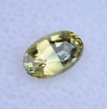 Load image into Gallery viewer, Kenya Yellow Sapphire Oval Gem - With a dash of Blue! - 0.73 ct.