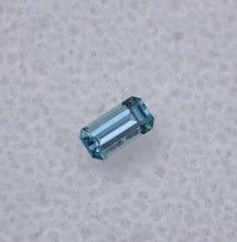 Load image into Gallery viewer, Chrome Kornerupine Gemstone - Long Emerald Cut - Purple/Blue Color - 0.16 ct.
