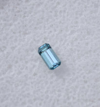 Load image into Gallery viewer, Chrome Kornerupine Gemstone - Long Emerald Cut - Purple/Blue Color - 0.16 ct.