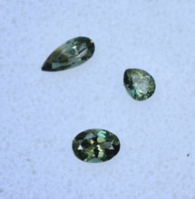 Load image into Gallery viewer, Madagascar Kornerupine Parcel - Dichroic Green Gems - SUPER Clean - 0.78 ctw.