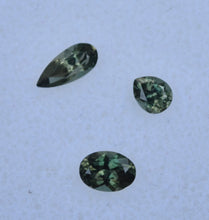 Load image into Gallery viewer, Madagascar Kornerupine Parcel - Dichroic Green Gems - SUPER Clean - 0.78 ctw.