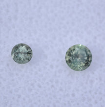 Load image into Gallery viewer, GREEN Montana Sapphires - Set of Two (2) Off-Size, Color Matched, Round Gems- 0.75 ctw.
