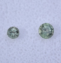 Load image into Gallery viewer, GREEN Montana Sapphires - Set of Two (2) Off-Size, Color Matched, Round Gems- 0.75 ctw.