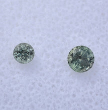 Load image into Gallery viewer, GREEN Montana Sapphires - Set of Two (2) Off-Size, Color Matched, Round Gems- 0.75 ctw.
