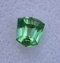 Load image into Gallery viewer, Piercingly Kelley-Green Vanadium Kornerupine Custom Gemstone - Original Design and Cutting by Scott Maier - 1.28 ct.