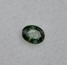 Load image into Gallery viewer, Parti-Color Australian sapphire - Half Yellow, Half Blue, and Shows as Deep Green - 0.64 ct.
