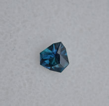 Load image into Gallery viewer, Astounding Chrome Kornerupine Gem - Intensely Polychroic - 0.49 ct. - Faceted by:  Scott Maier
