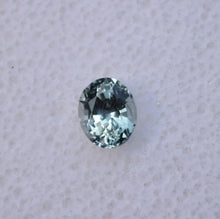 Load image into Gallery viewer, A Shifty Little Montana Sapphire - Clean, and light in color - Has Purple, Green, Blue, and Colorless Moods - 0.63 ct.
