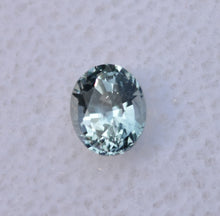 Load image into Gallery viewer, A Shifty Little Montana Sapphire - Clean, and light in color - Has Purple, Green, Blue, and Colorless Moods - 0.63 ct.

