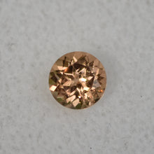 Load image into Gallery viewer, VERMONT Hessonite Garnet Gemstone - Ultra Rare - 0.61 ct. Round Brilliant
