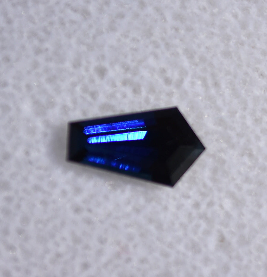 DEEP Blue Sapphire with Insane Blue Laser Flashes - Unique and Fun - 1.46 ct.