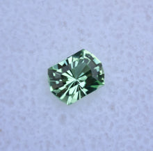 Load image into Gallery viewer, Top Tier Vanadium Kornerupine Custom Gemstone - Rich Greens and Precision Cutting! 0.89 ct.
