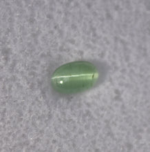 Load image into Gallery viewer, Cats Eye Kornerupine Cabochon - Sharp Ray and Clean Material - 0.58 ct.
