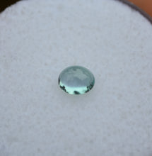 Load image into Gallery viewer, LOUPE CLEAN Chrome Kornerupine Cabochon - Good Balance of Teal and Purple - 0.33 ct.
